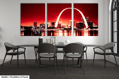 a dining room table with a view of the st louis skyline