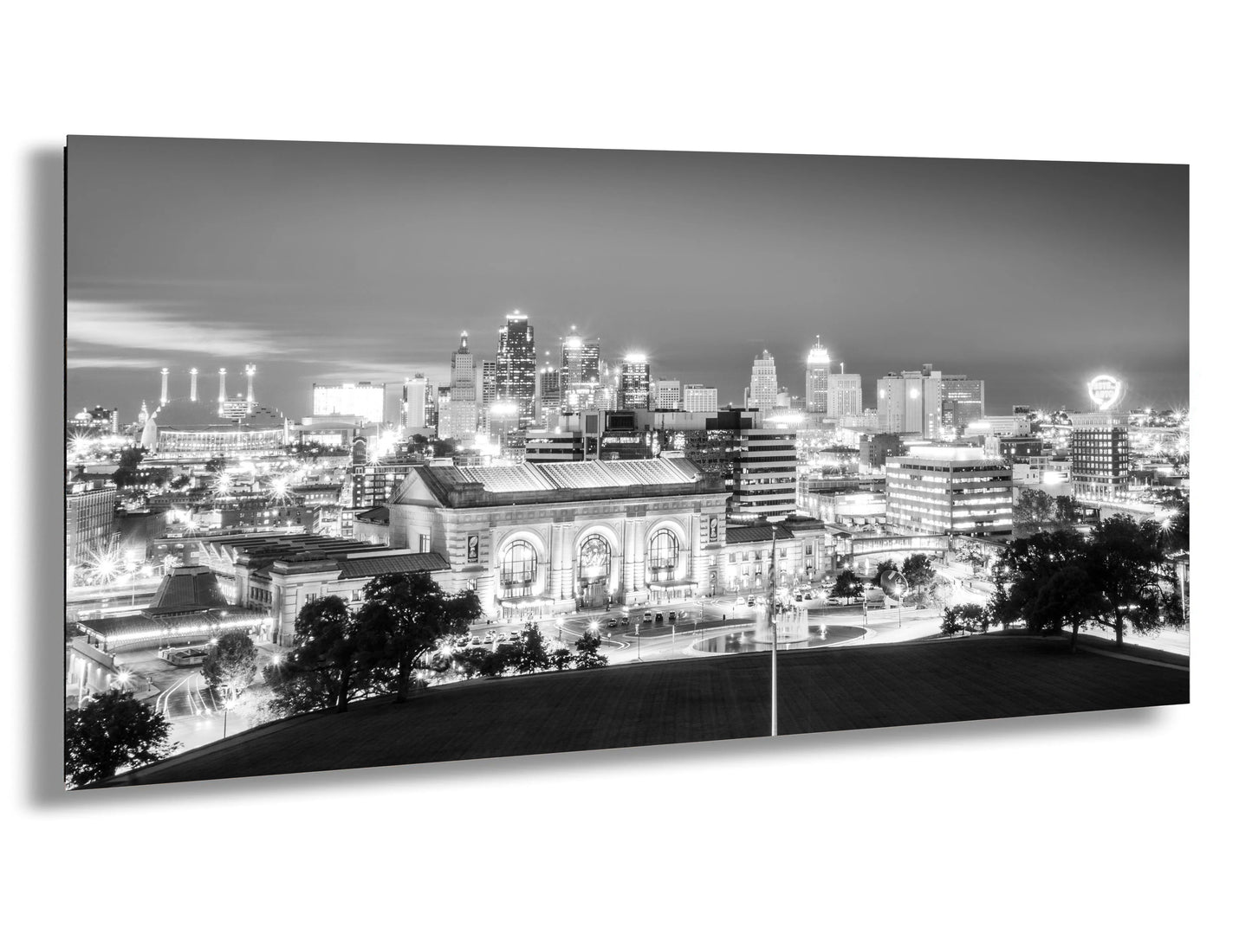 a black and white photo of a city at night