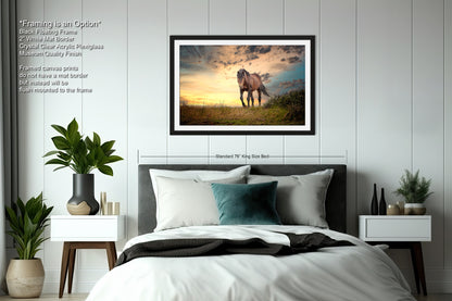 a bedroom with a bed and a picture hanging on the wall