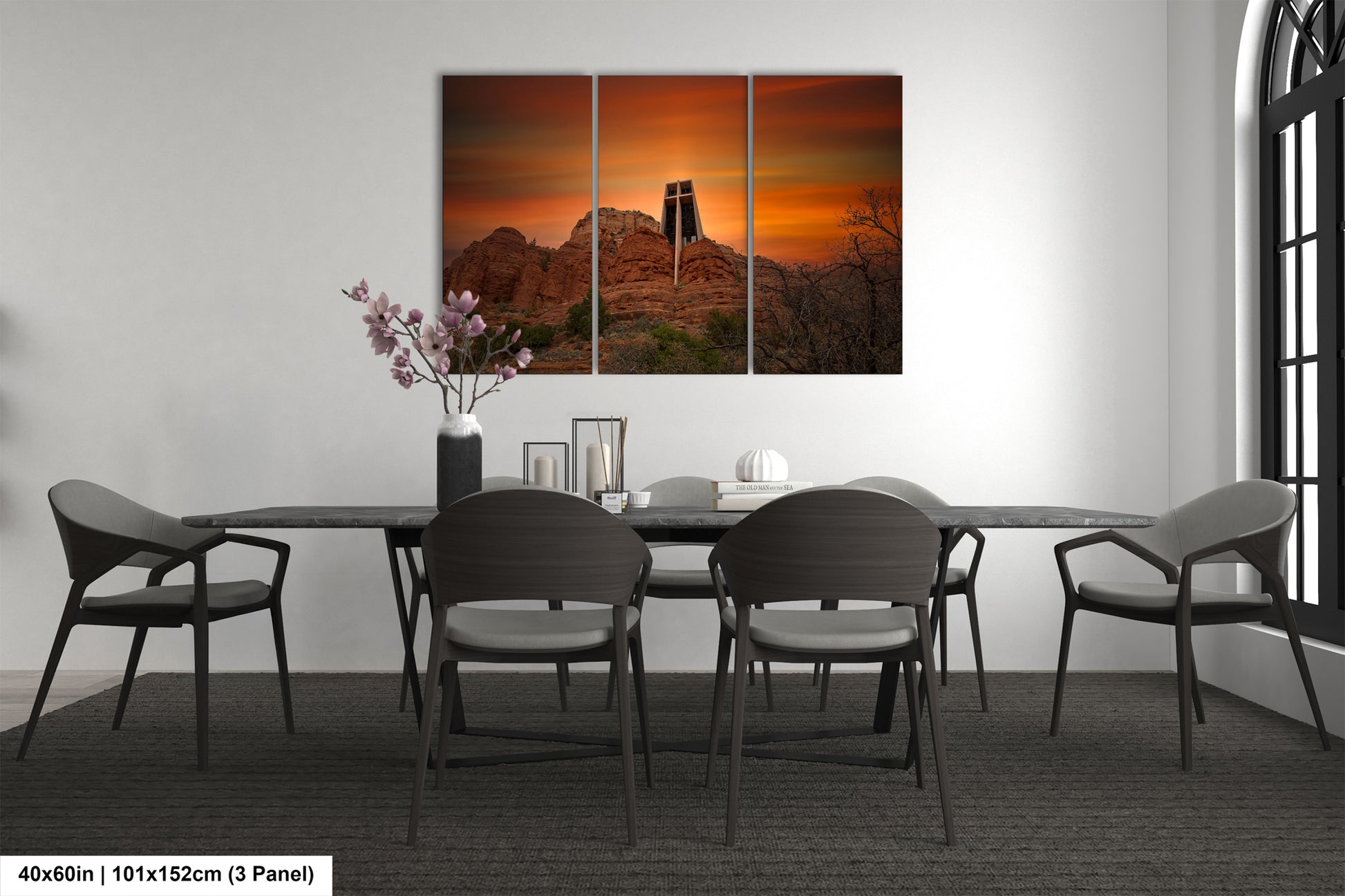 a dining room with a table and four chairs