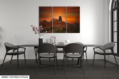 a dining room with a table and four chairs