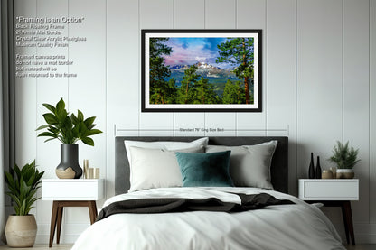 a bedroom with a large bed and a painting on the wall