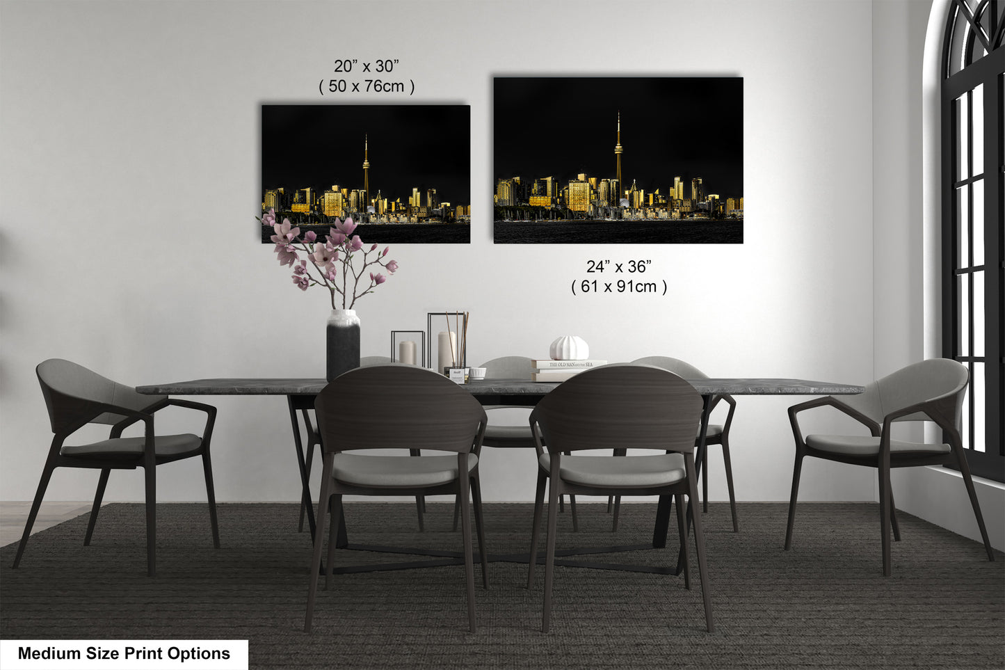 a dining room table with chairs and a vase of flowers