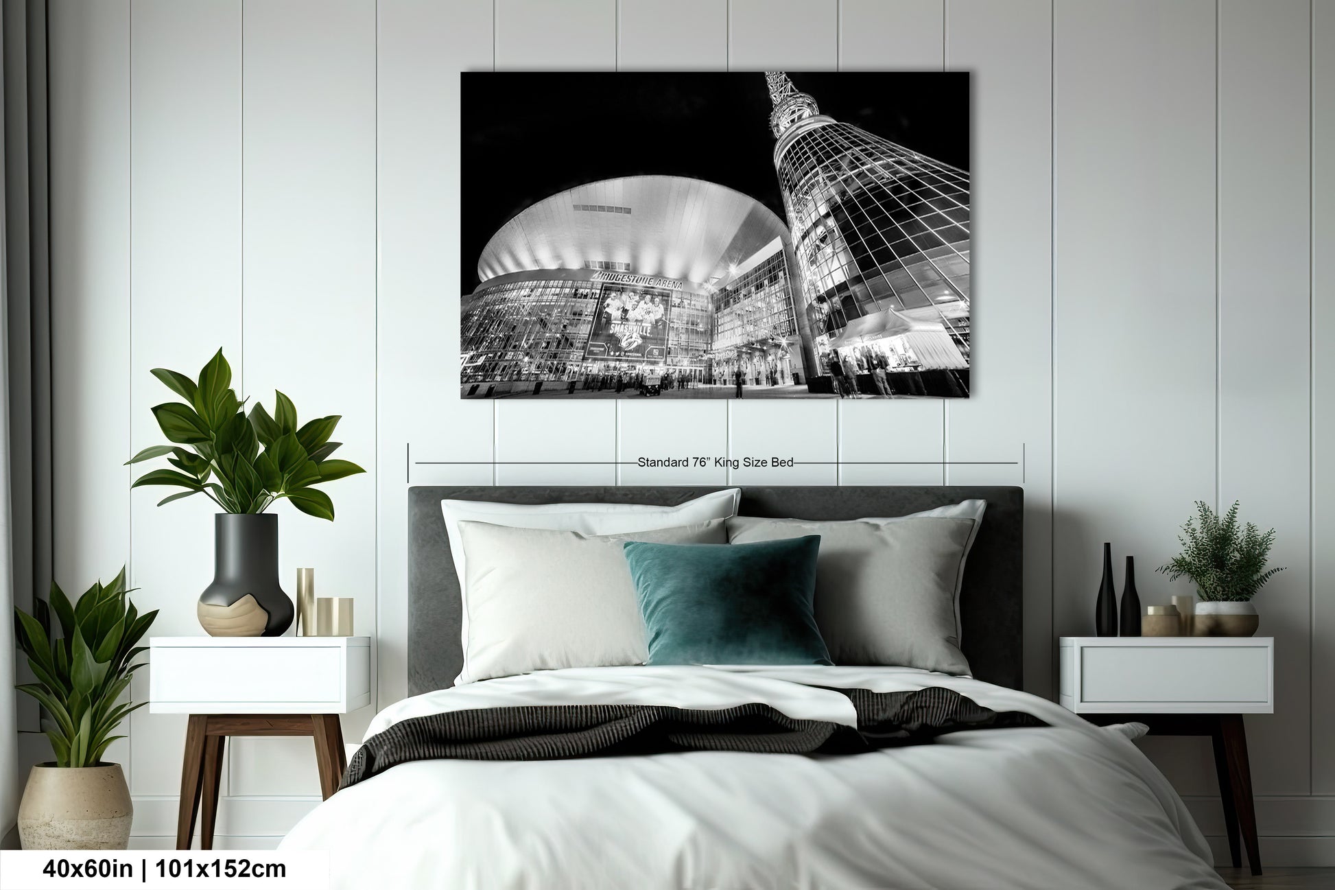 a black and white photo of a bedroom