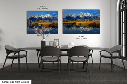 a dining room with a table and chairs