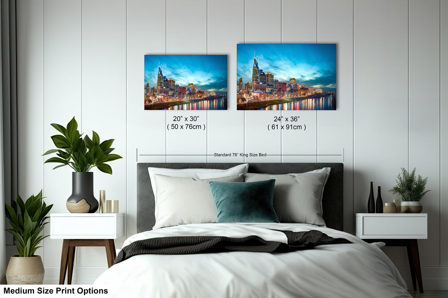 a bedroom with a bed and two pictures on the wall