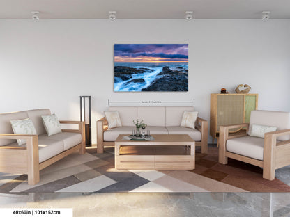 a living room filled with furniture and a painting on the wall