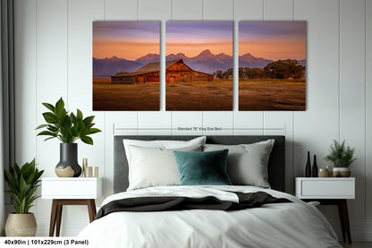a bed room with a neatly made bed and two pictures on the wall