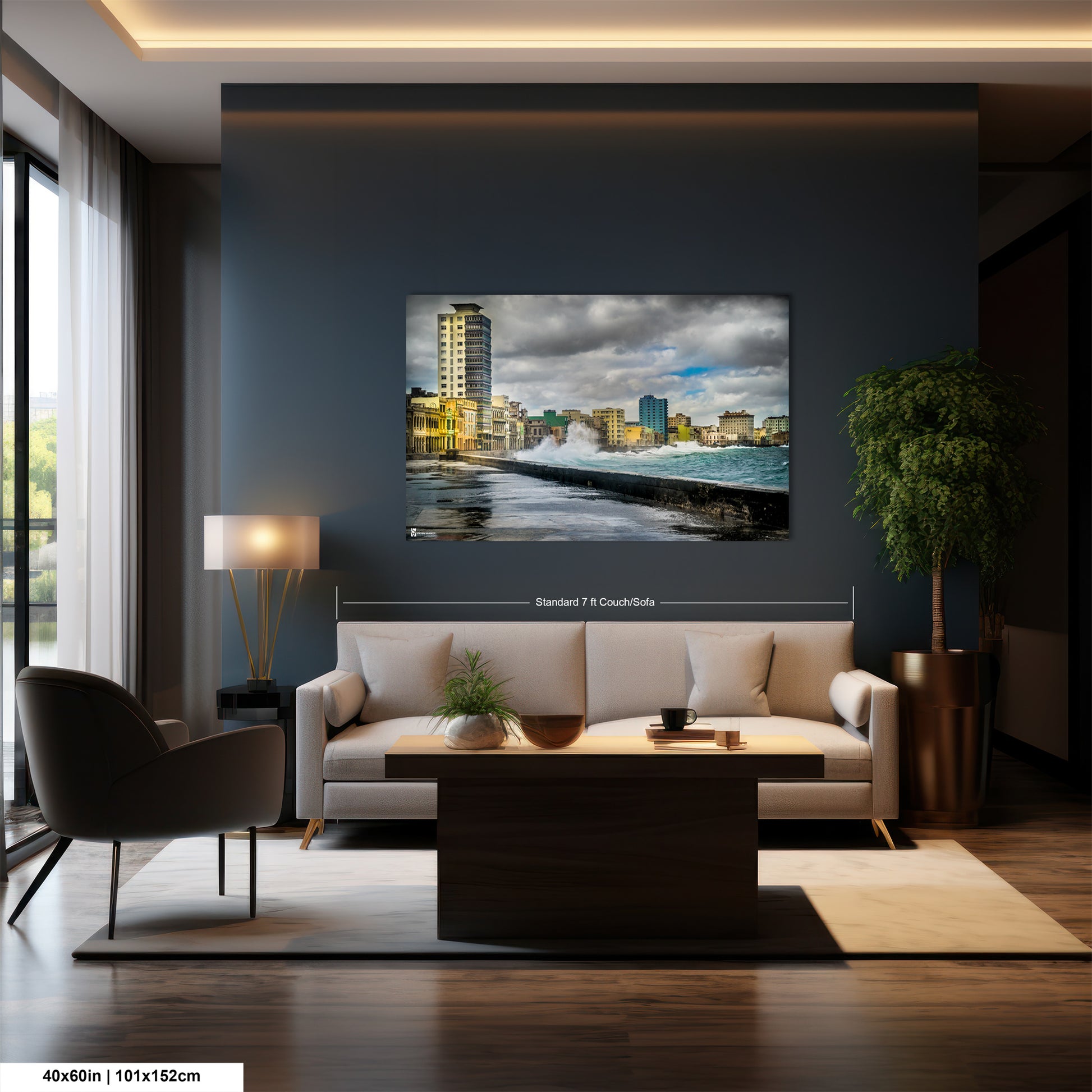 a living room with a couch a table and a painting on the wall