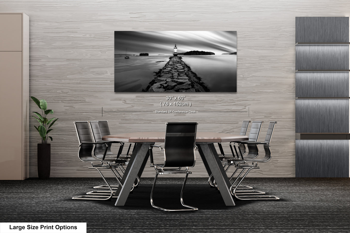 a black and white photo of a table and chairs