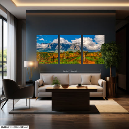 a living room filled with furniture and a painting on the wall