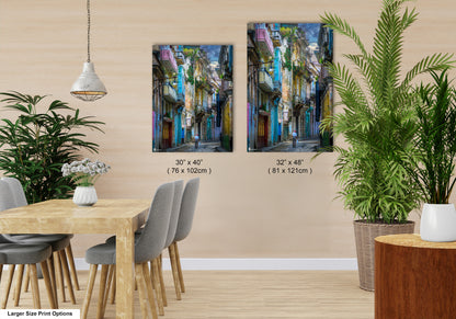 a dining room with a table and chairs next to a potted plant