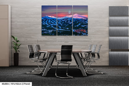 a dining room with a table and chairs