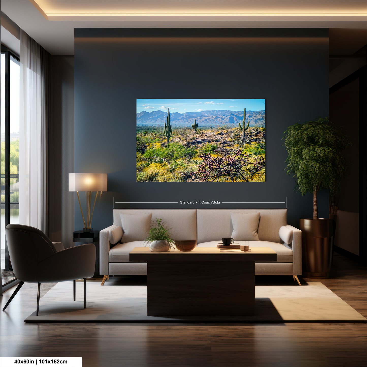 a modern living room with a large wall-mounted painting of a desert landscape featuring cacti and mountains.