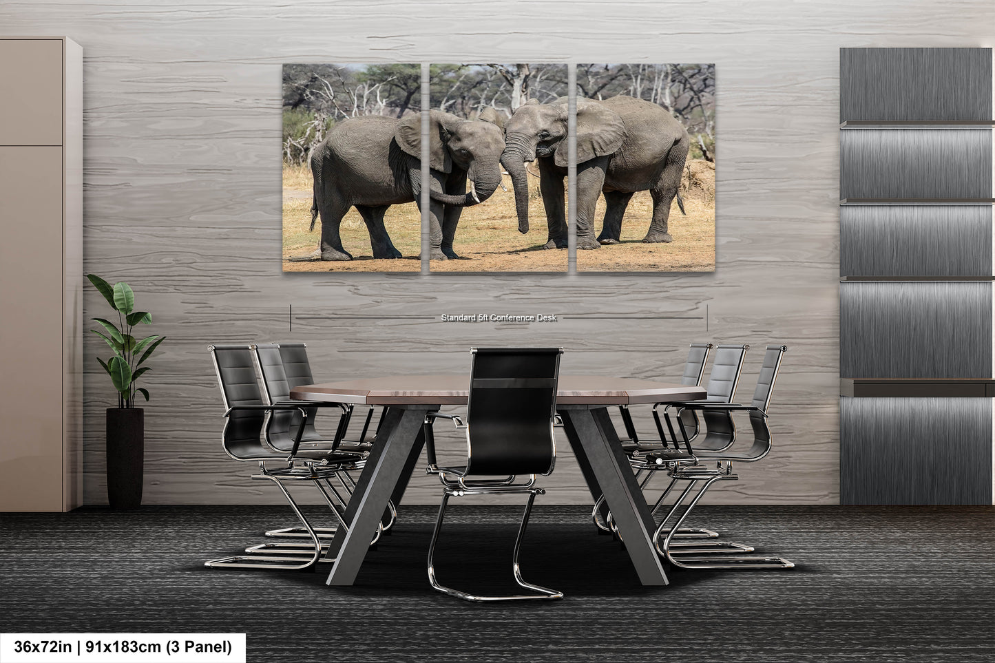 a couple of elephants standing next to each other