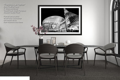 a black and white photo of a dining room