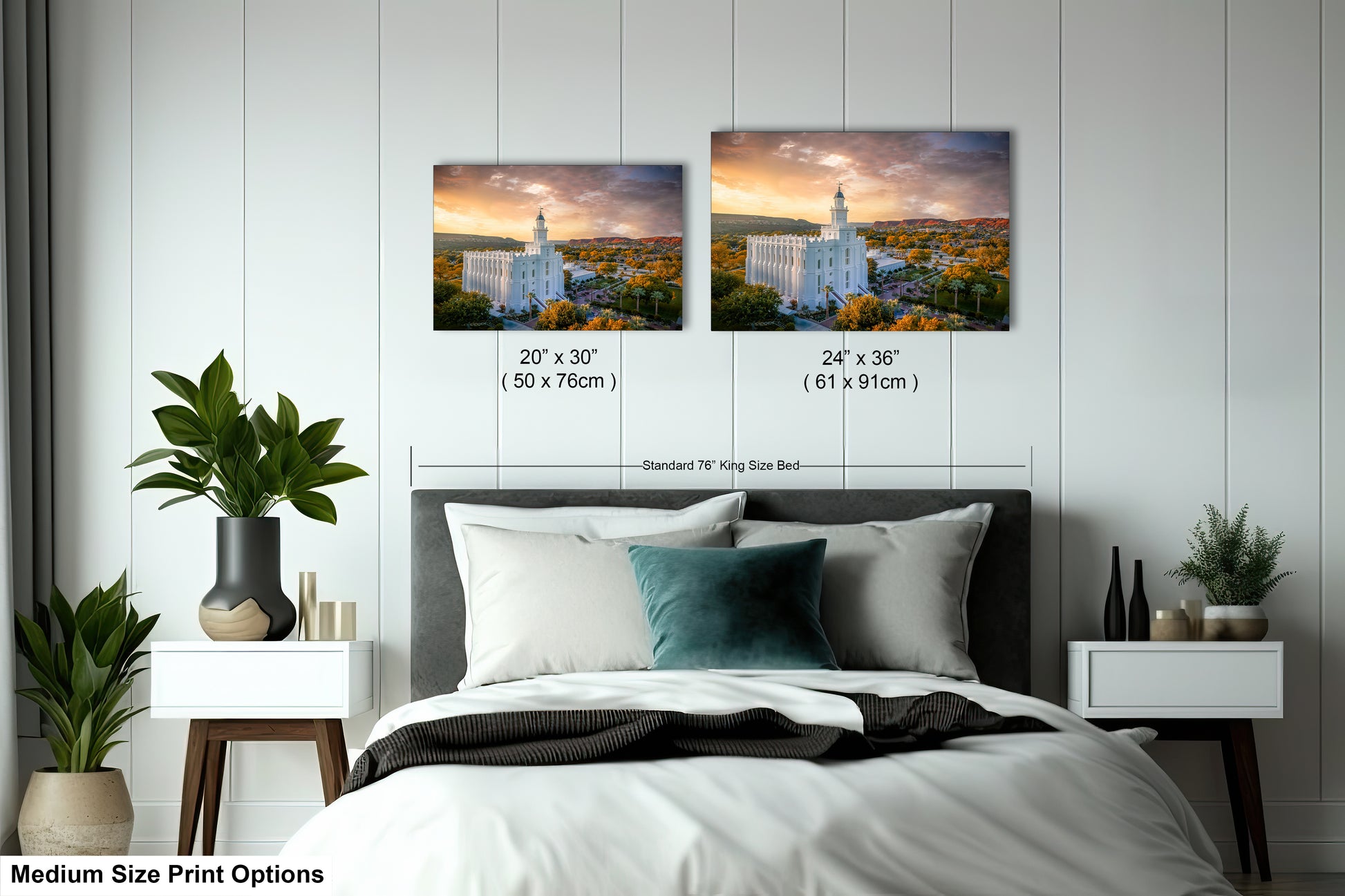 a bedroom with a bed and two pictures on the wall