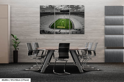 a football stadium with a green field in the middle of it
