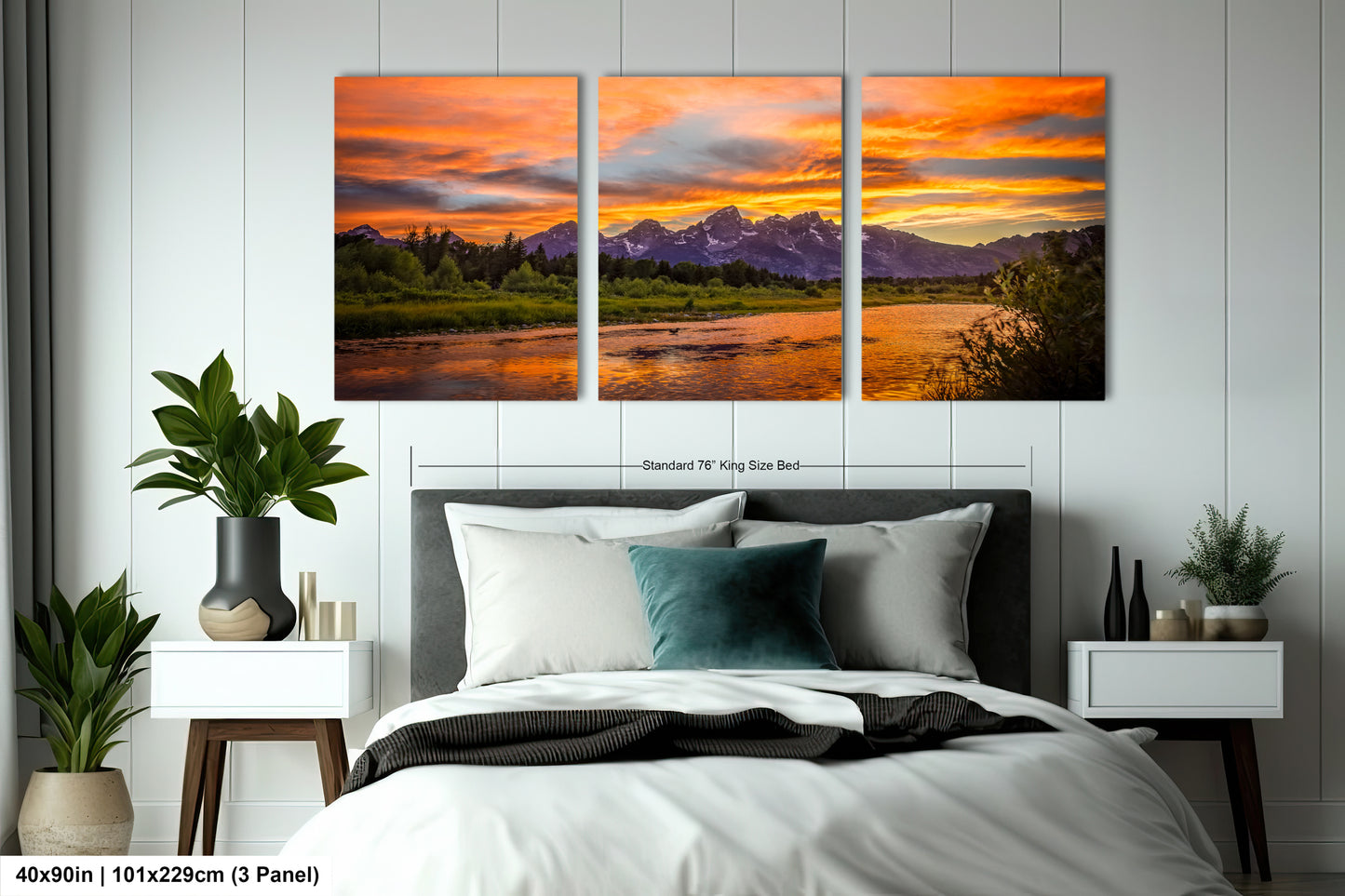a bed room with a neatly made bed and two paintings on the wall
