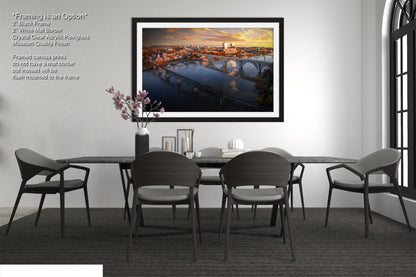 a picture of a dining room with a table and chairs