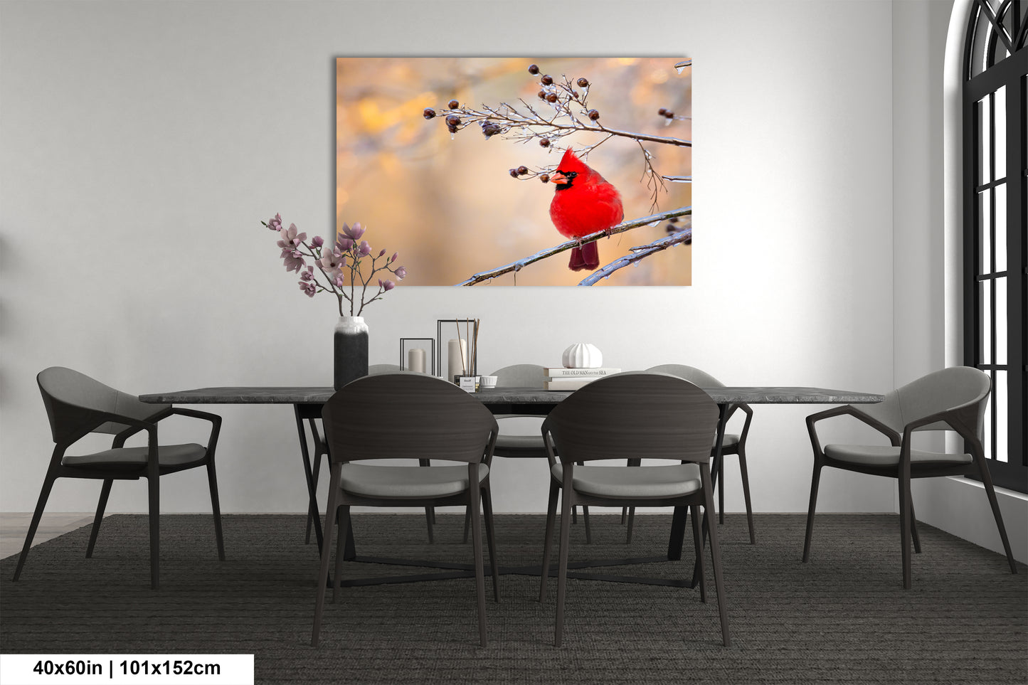 a red cardinal sitting on a branch in a dining room