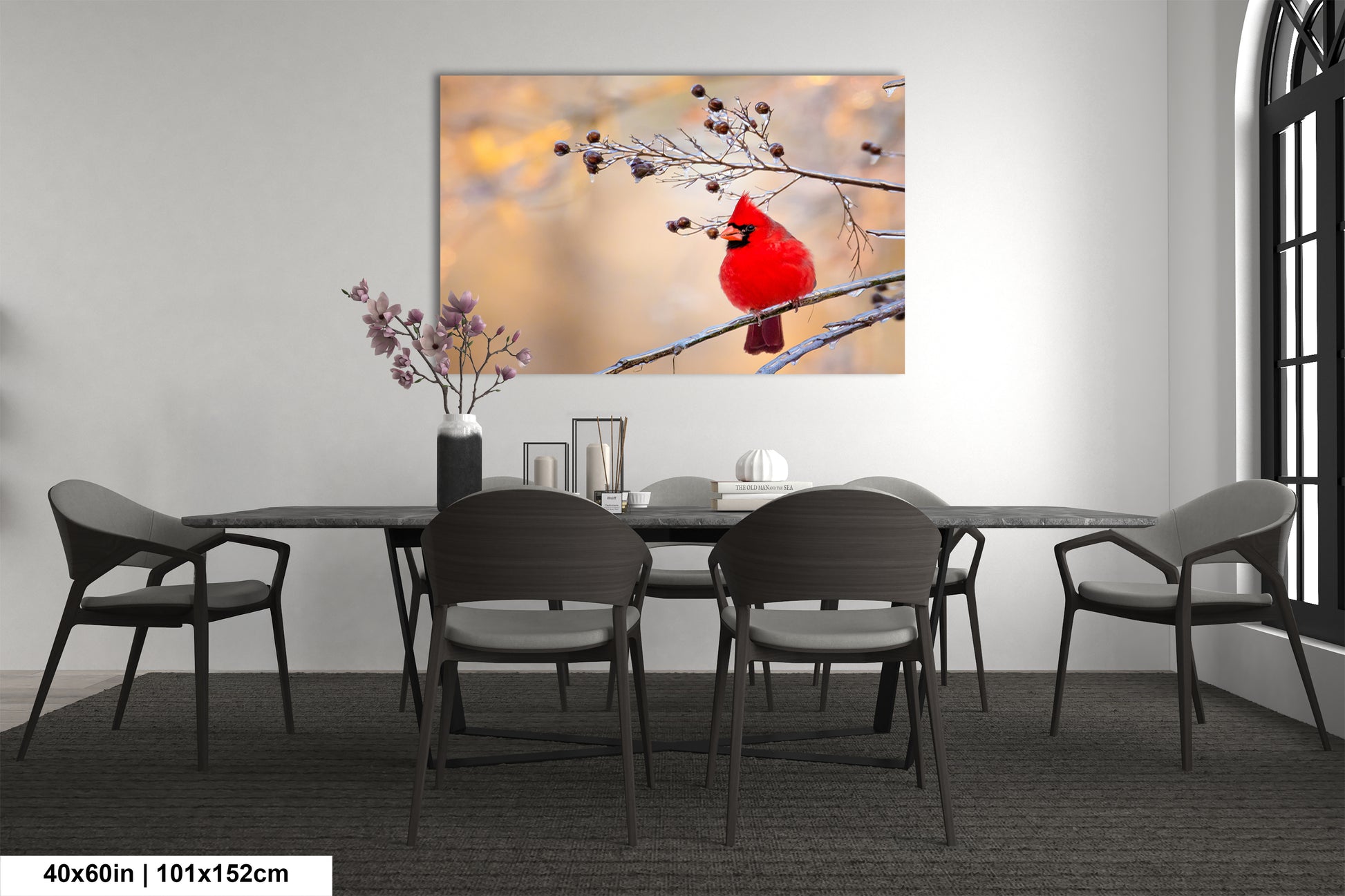 a red cardinal sitting on a branch in a dining room