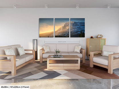a living room filled with furniture and a painting on the wall