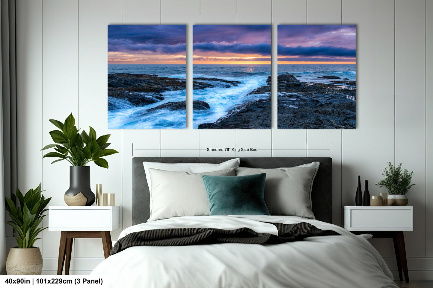 a bedroom scene with focus on the bed and the ocean