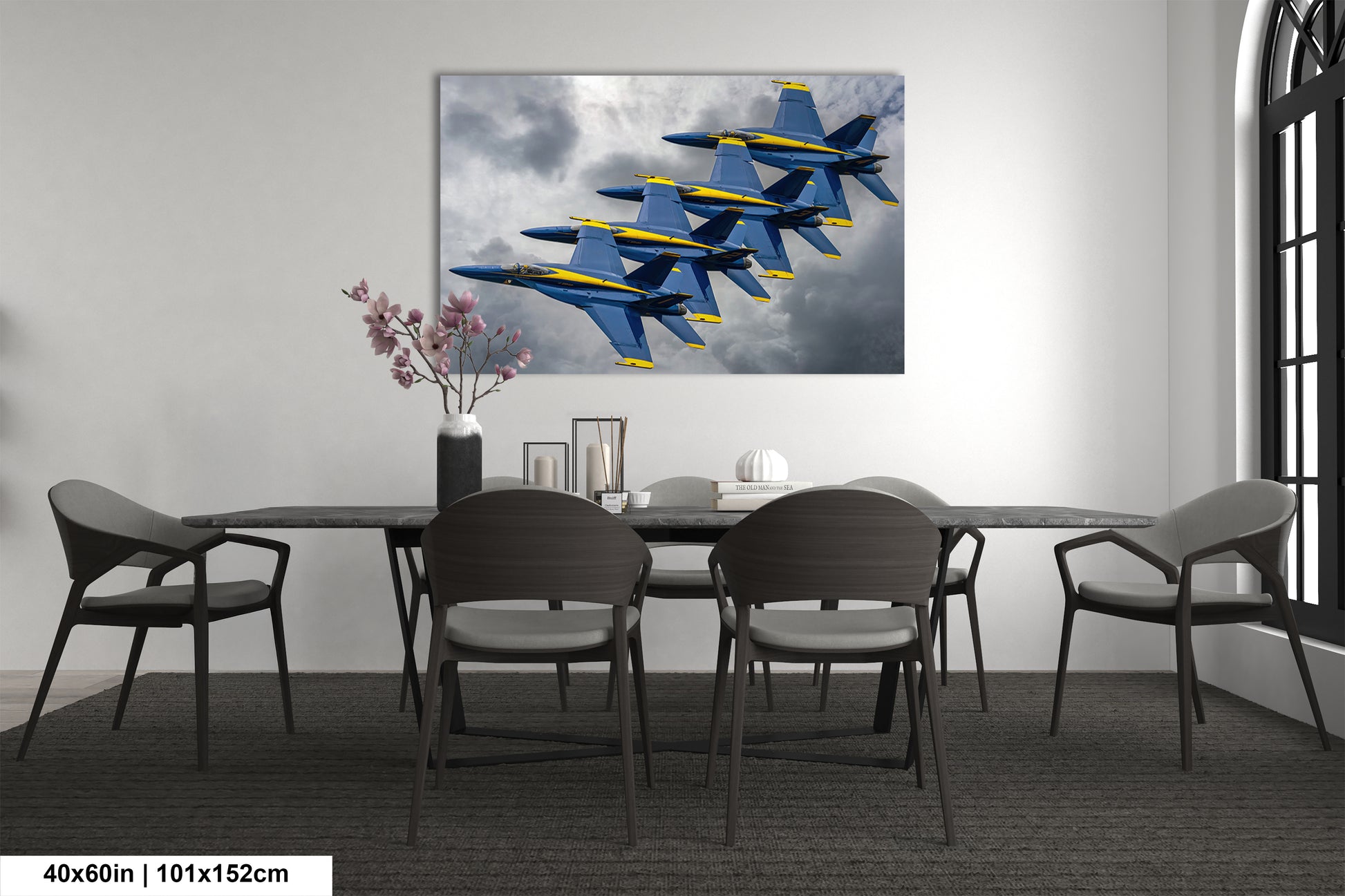 a group of fighter jets flying through a cloudy sky