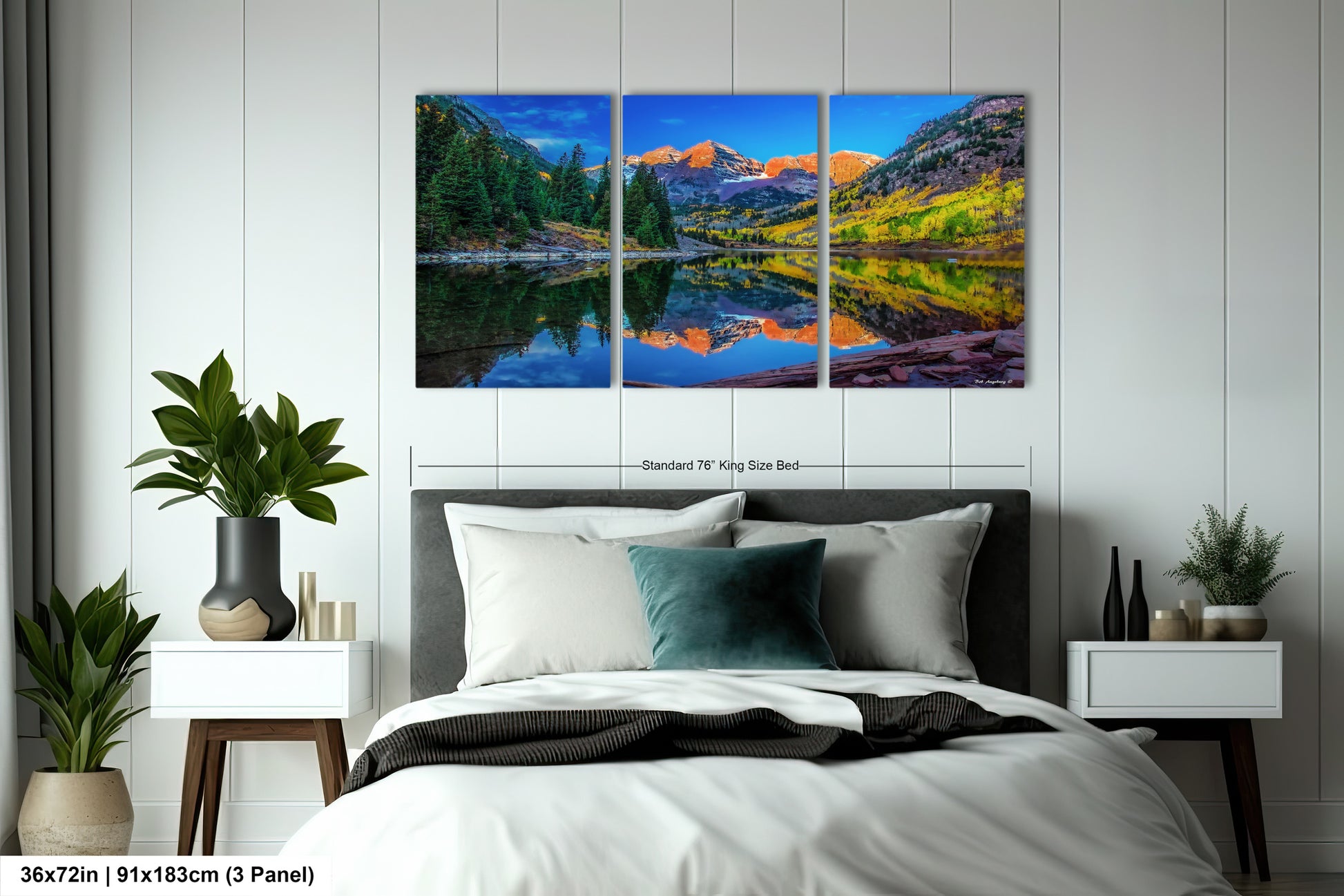 a bedroom with a bed and a painting on the wall