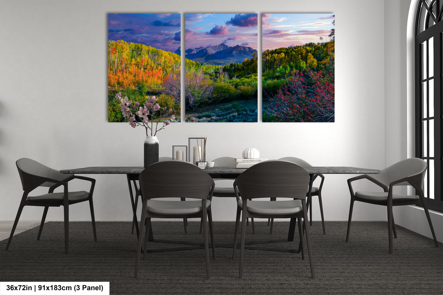 a dining room with a table and four chairs