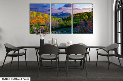 a dining room with a table and four chairs