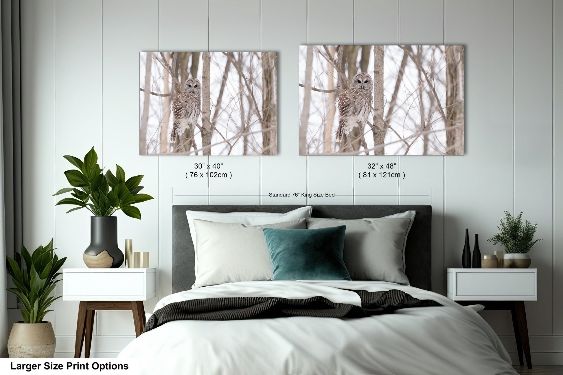 a bedroom with a bed and two pictures on the wall