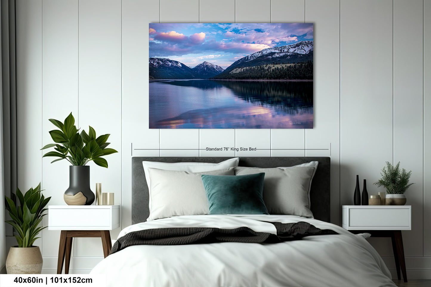 a bedroom with a bed and a painting on the wall