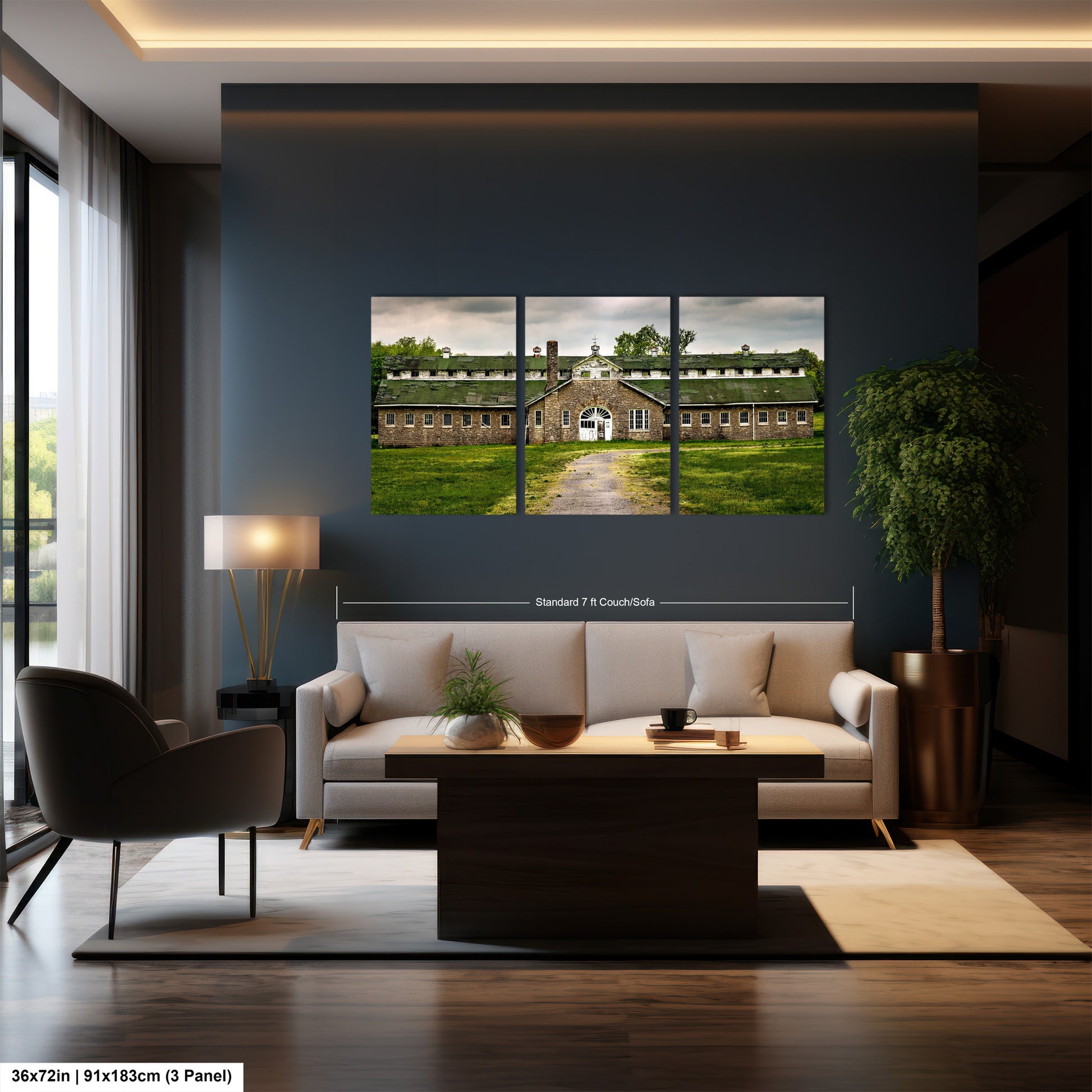 a living room with a couch and a painting on the wall