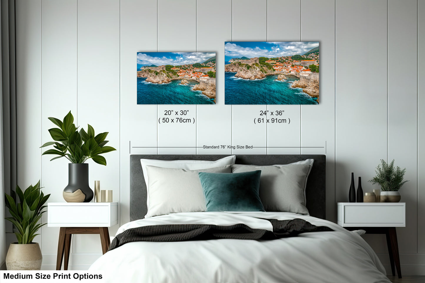 a bedroom with a bed and two pictures on the wall