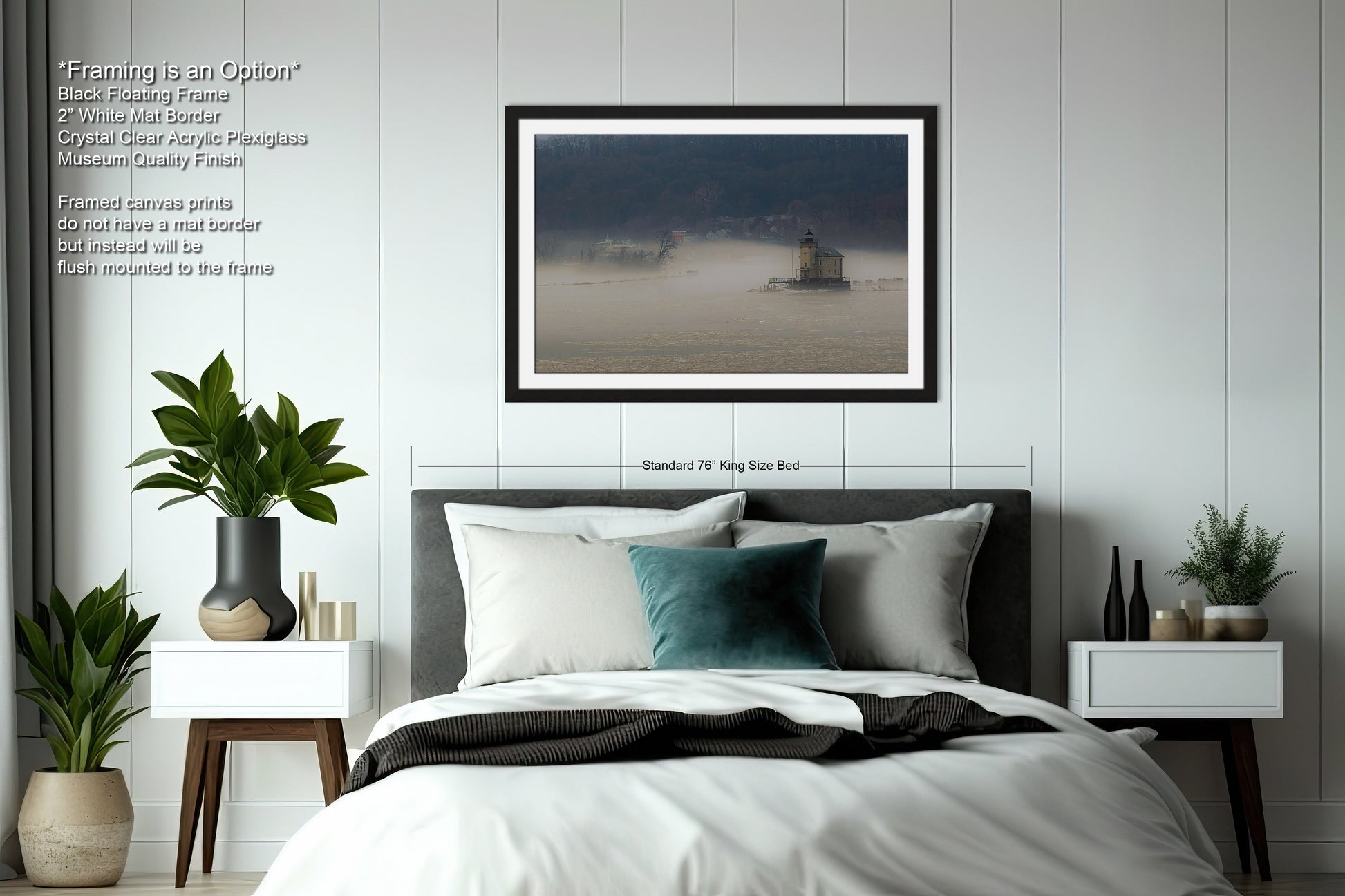 a bedroom with a bed and a picture hanging on the wall