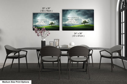 a dining table with four chairs and a vase with flowers