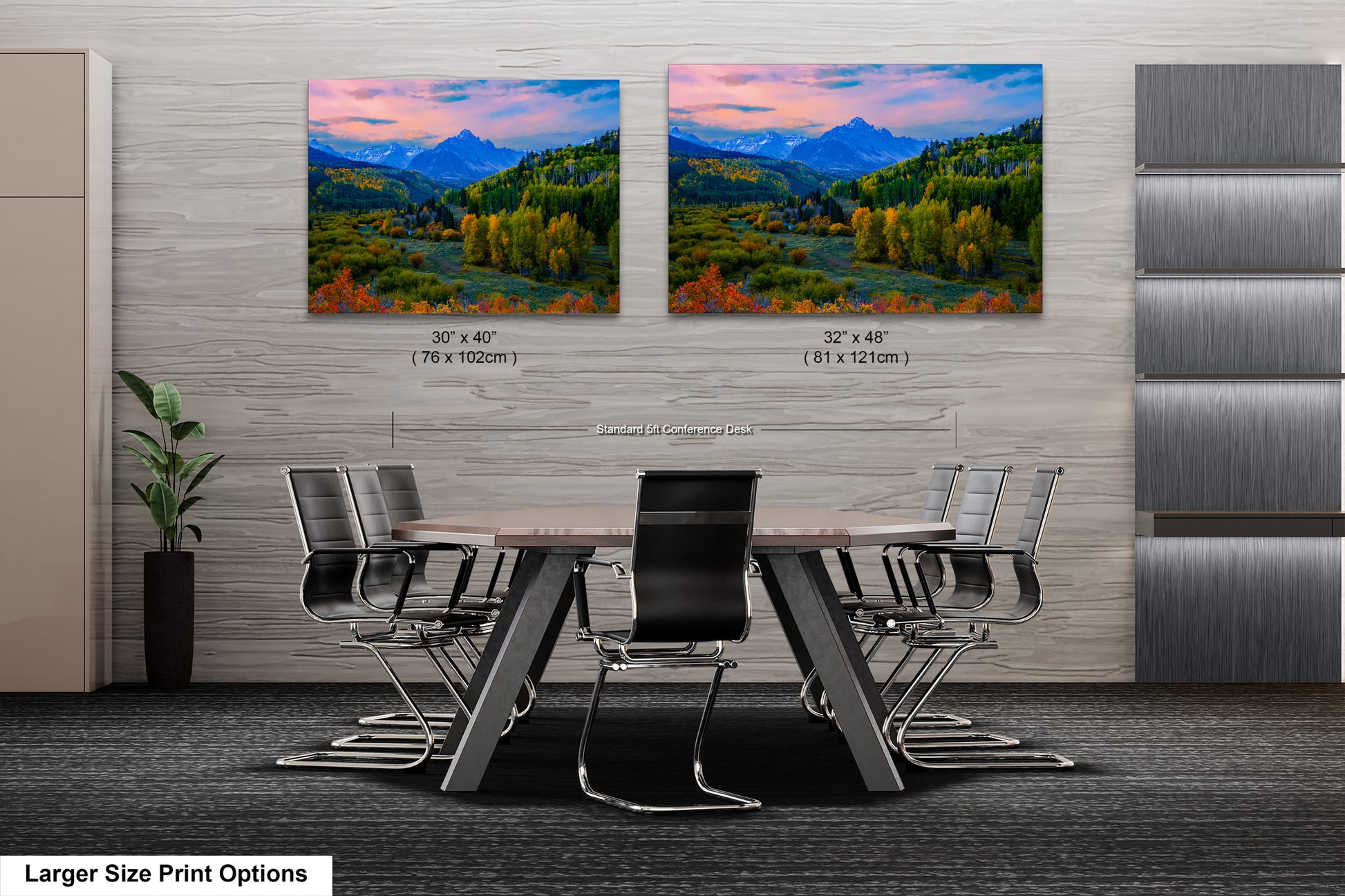 a dining room table with chairs and a painting on the wall