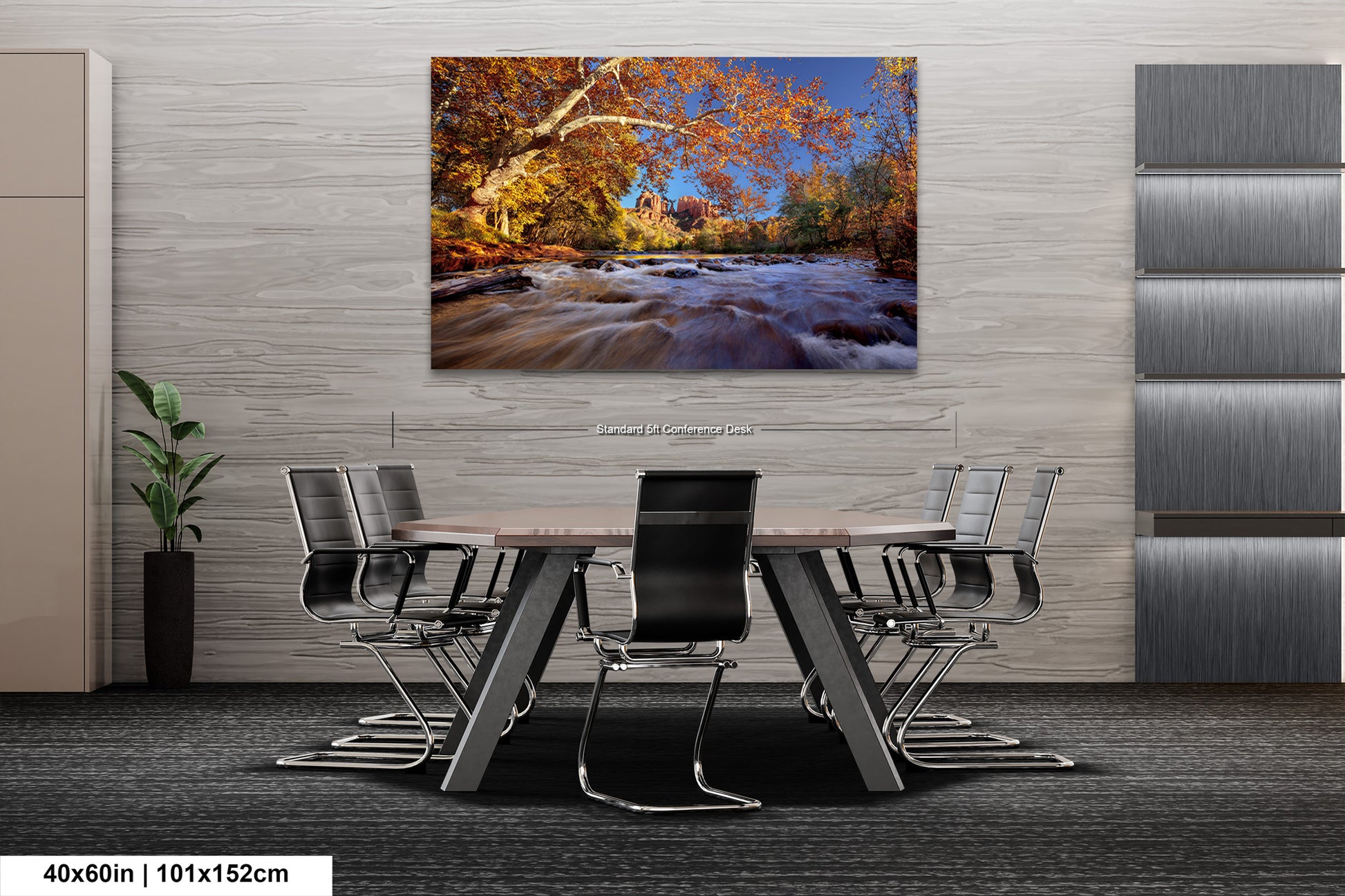 a dining room table with chairs and a painting on the wall