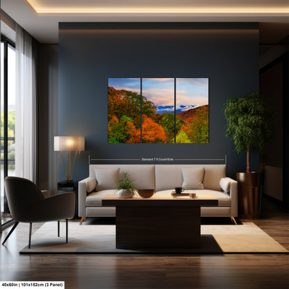 a living room filled with furniture and a painting on the wall