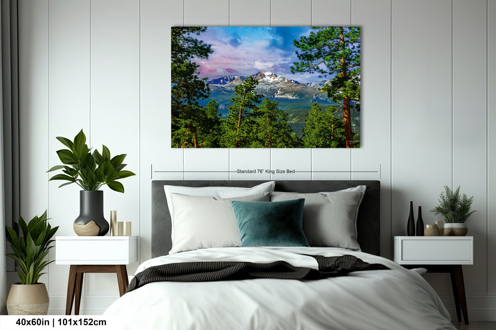 a bedroom with a bed and a painting on the wall