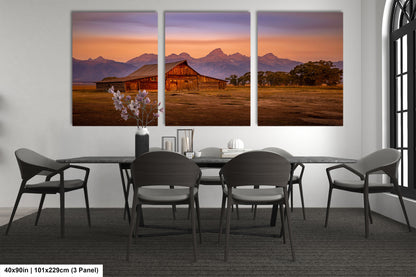 a dining room with a table and chairs