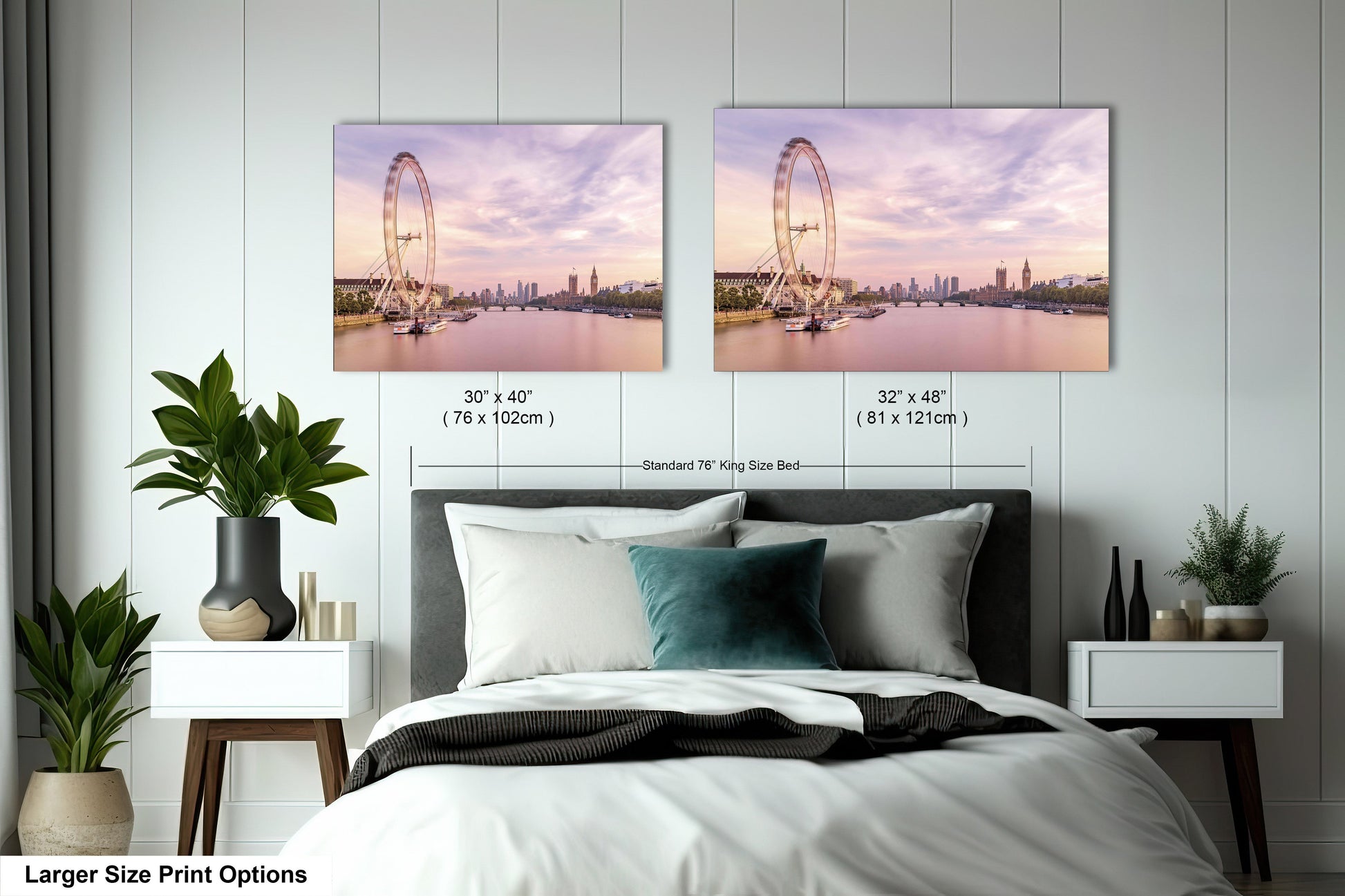 a bedroom with a large bed and two pictures on the wall