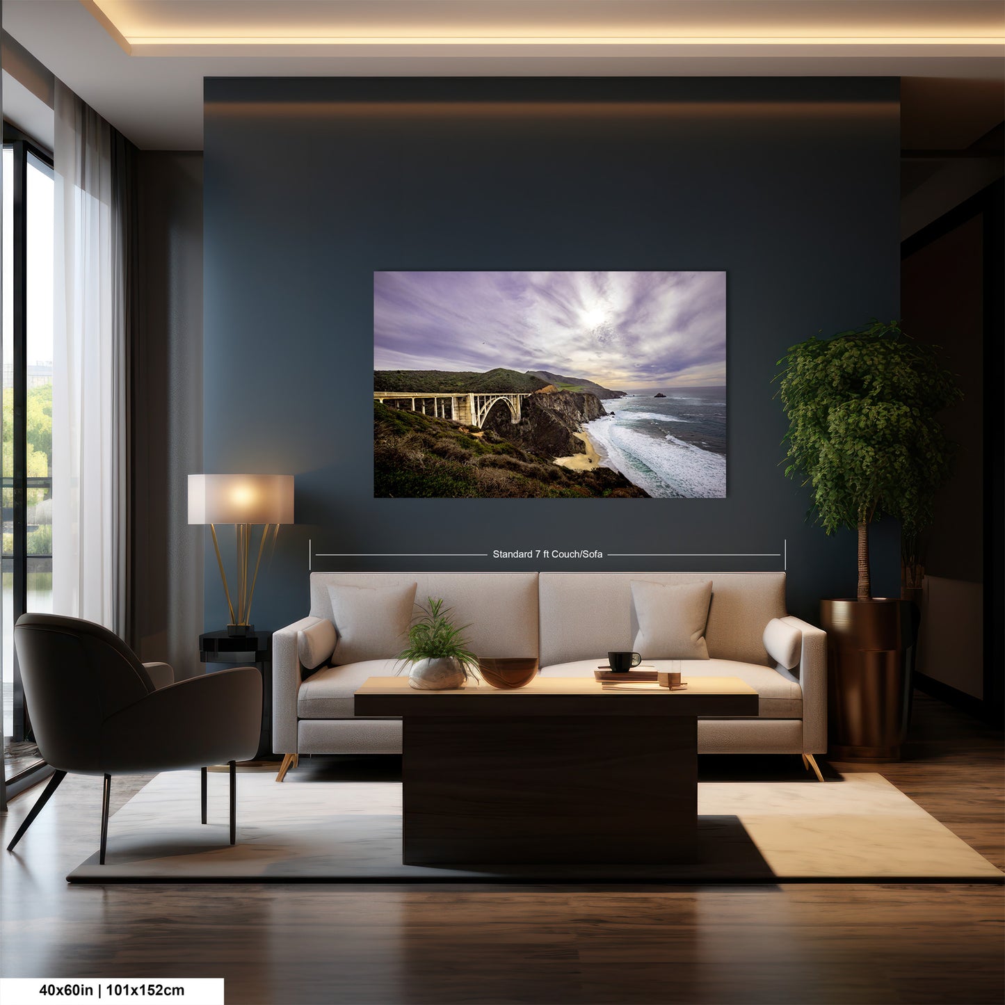 a living room with a couch and a large picture on the wall