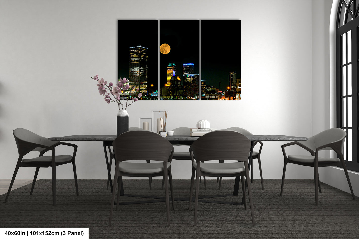 a dining room with a table and chairs