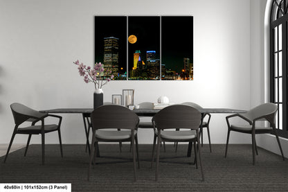a dining room with a table and chairs