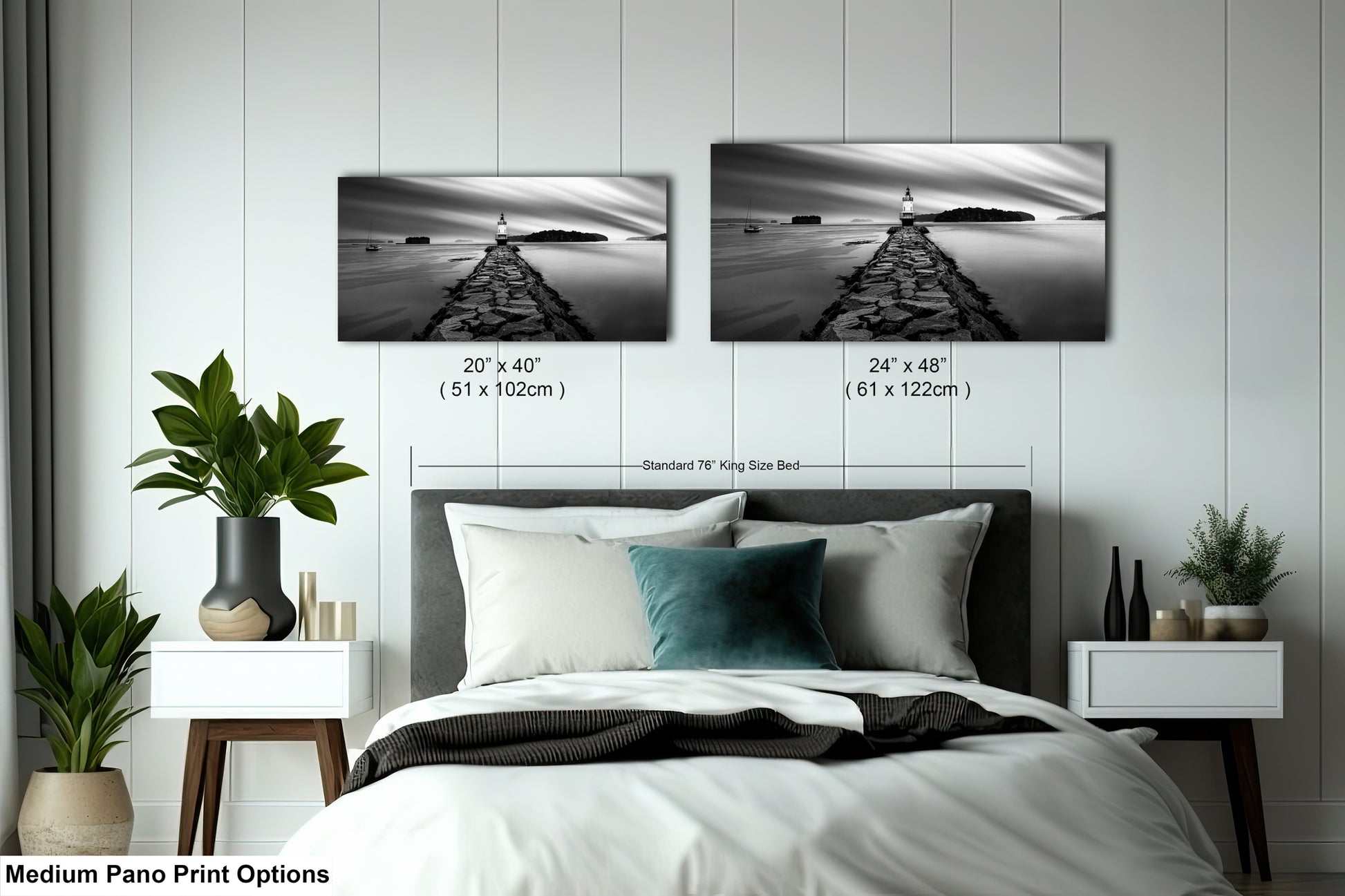a bed room with a neatly made bed and two pictures on the wall