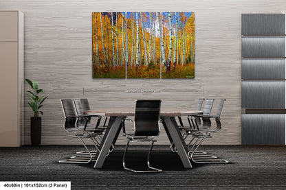 a dining room with a table and chairs and a painting on the wall