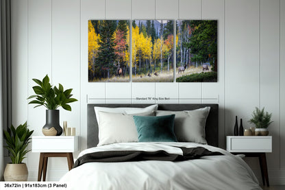 a bedroom with a large bed and a painting on the wall